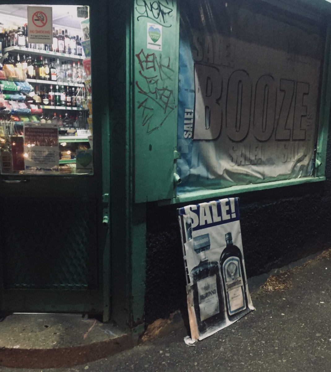 shane_dillon's tweet image. The  photo that makes up my Twitter background is an off-licence. It was late in the evening when I clicked it strolling around #Sutton The whole look of this off licence especially the lighting reminded me of the film #TreesLounge