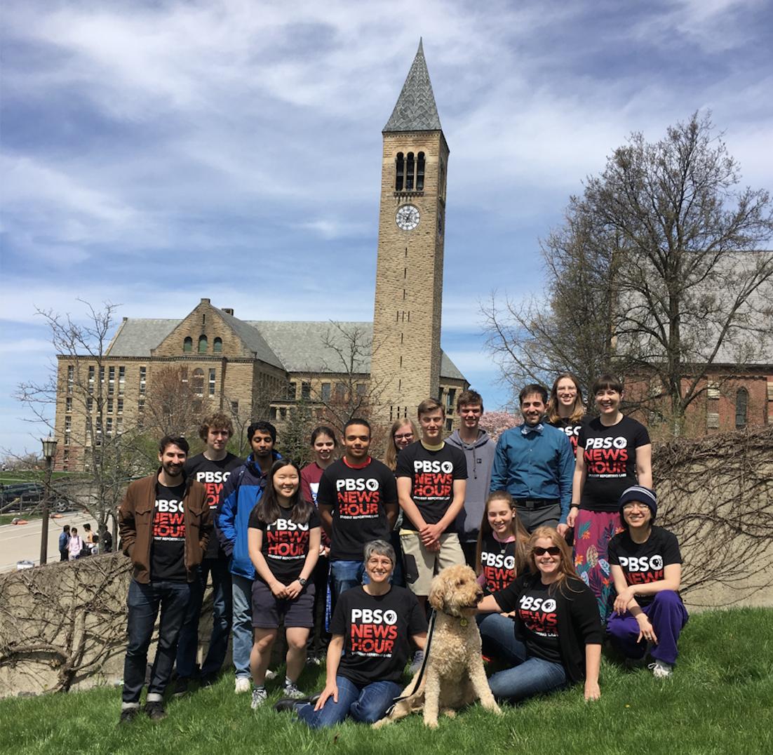CornellEngComm's tweet photo. ENGRG 3360 students in our @PBS @NewsHour @reportinglabs t-shirts by @Cornell's iconic clock tower. As the course winds down for the semester we will hear @PechaKucha presentations and see videos on great science and engineering topics. #CornellEngComm #CornellEng https://t.co/VMwPLZVqFU