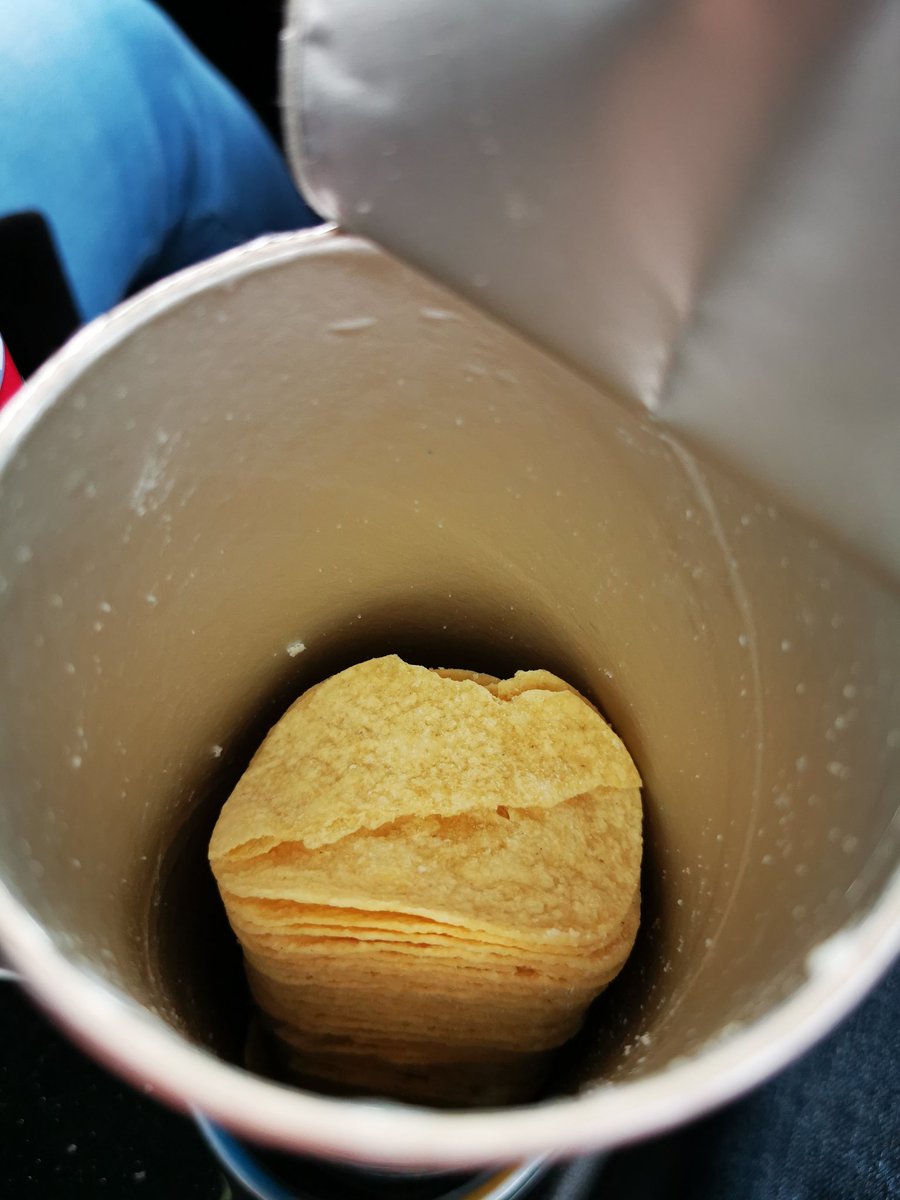 Andio1234's tweet photo. @Tesco @Pringles_UK just opened up my pack of salt and vinegar pringles I have just bought from Tesco and found them half empty! What's going on?? https://t.co/n2VhGdhyvB