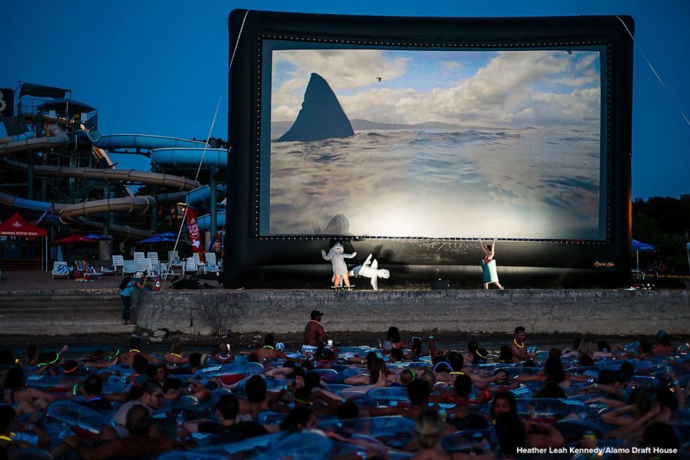 ABC's tweet photo. “We hire scuba divers to go under people and tug on toes during key scenes”: This screening of "Jaws" on a lake will get your heart racing. https://t.co/pWtjnkVHSH https://t.co/r2GIbALCcg