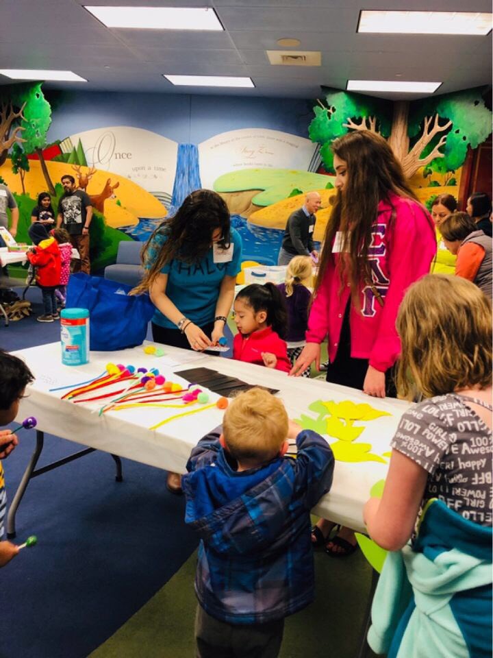 HALO students volunteering at <a href="/TopekaLibrary/">Topeka & Shawnee County Public Library</a>  HALO for Día de los Niños yesterday .