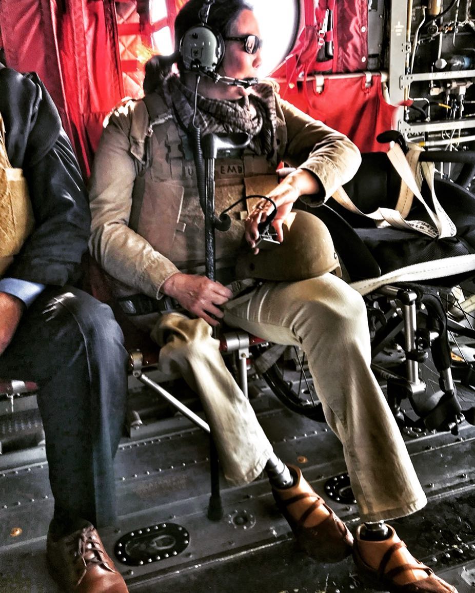 Took this photo in Iraq last week: <a href="/SenDuckworth/">Tammy Duckworth</a> looking down as the helicopter taking us to Taji circled the spot where she was shot down 15 years ago while piloting her Blackhawk. This is a picture of courage, commitment and grit – I've got a new hero. instagram.com/p/BwuOrddAKv4/