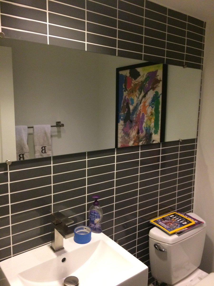 Bathroom mirror with chrome clips!