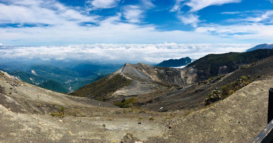 Tico_Lingo's tweet image. Volcano views and unreal hues! Volcano Irazù in Central Costa Rica looks out over both coasts of this small but lush country. Can you spot the sloth in this picture? #VolcanoViews