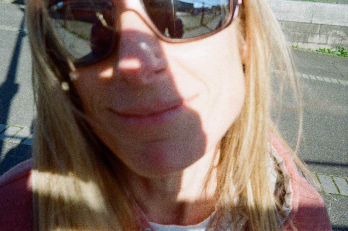 Document_Now's tweet image. Girl on street. 
Olympus Trip 35. 
Kodak.