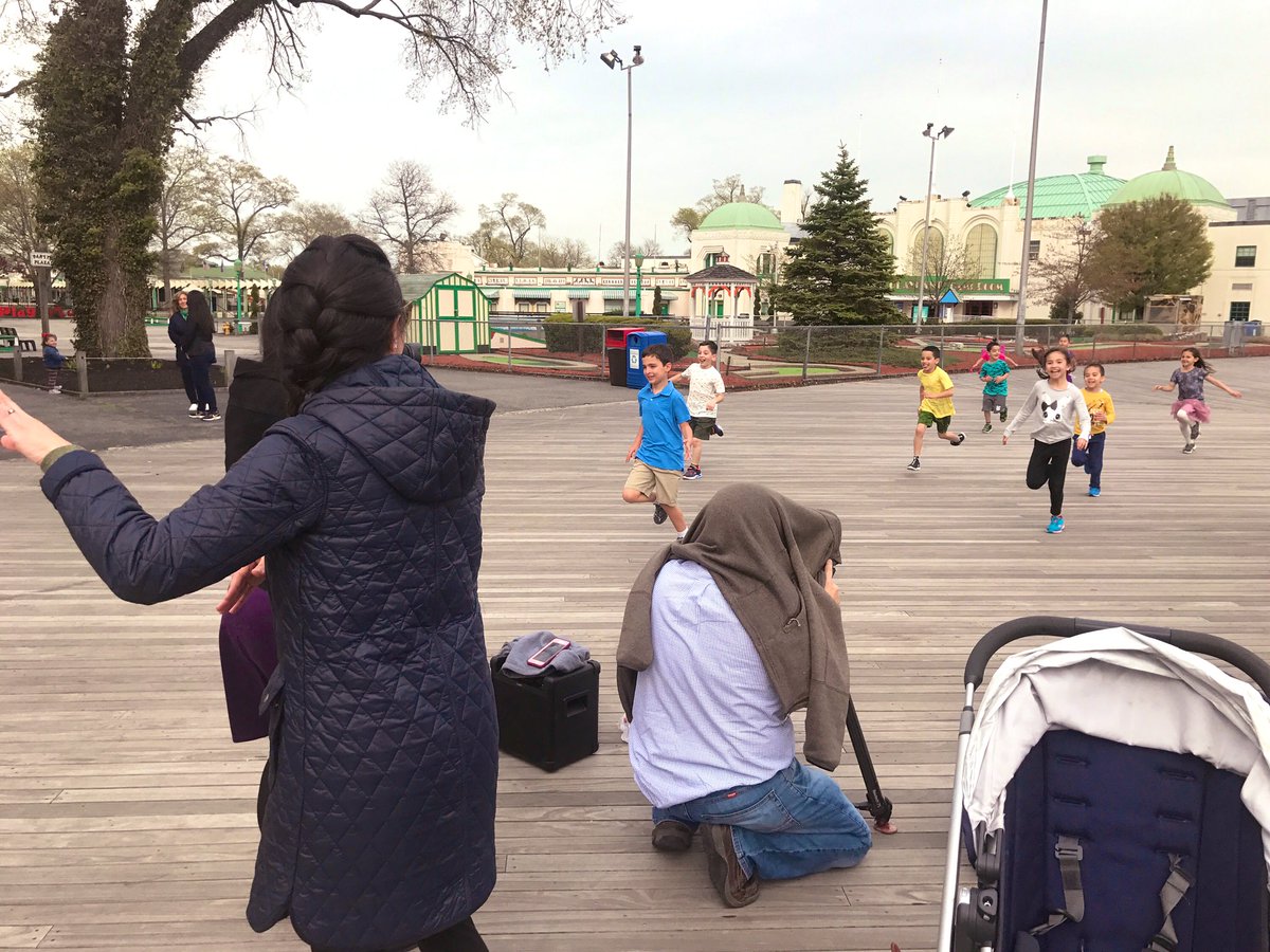 CCioffi's tweet photo. Shooting the new playland commercial..... see those kids that’s what pure joy looks like. And also see Carl the photographer under his sweater blocking the sun out #sunproblems https://t.co/ulmrsYY3EF