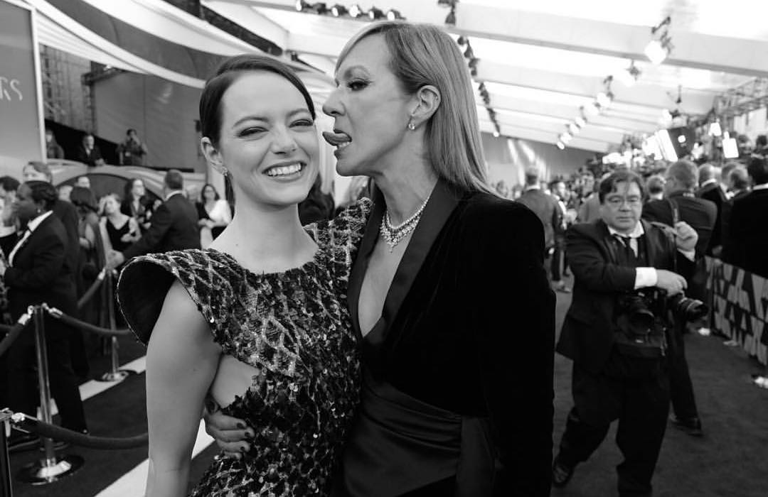 Emman on stage performing in a big time