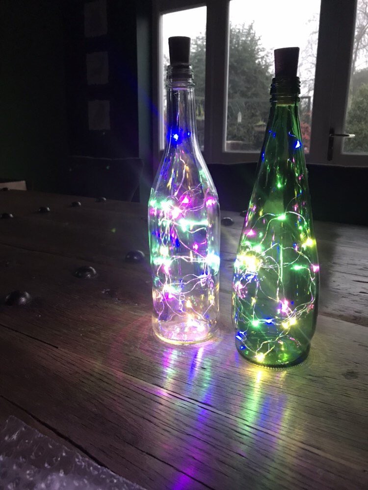 Excited to share this item from my #etsy shop: Recycled Bottle Light #art #sculpture #bottlelight #fairylights #homedecor #party #partydecorations #tabledecoration #forsale #etsyshop #greenbottle #loveheart etsy.me/2IPLE45