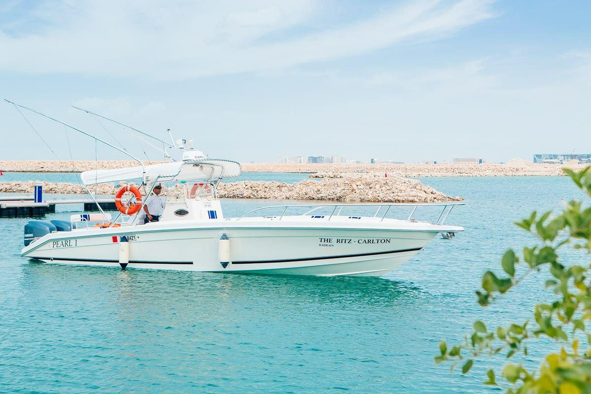 RitzCarlton's tweet photo. Captain’s orders this season. - It’s time to set sail and discover Bahrain's 33 islands on our Pearl 1 with accompaniments of a gourmet picnic: https://t.co/5E3f22zLhV https://t.co/WzqXGCwEFm
