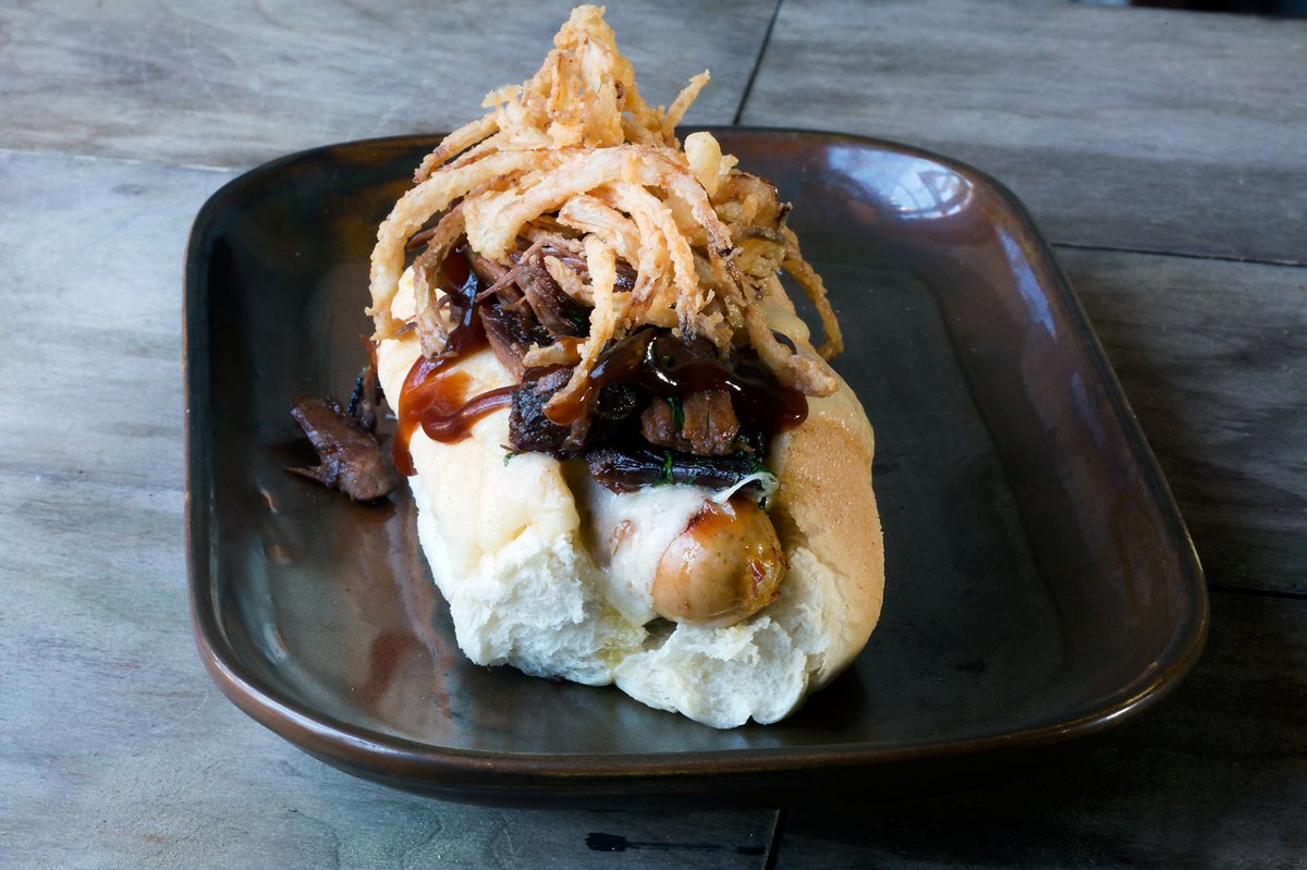 What happens when we bring our love of quality ingredients to the classic hot dog? Well, we start with rare breed bratwurst, add BBQ pulled beef, fried onions &amp; Merryfield cheese. Available every day at The Cricketers. 🍴 #brightonroast #pubfood #foodie
 brightonroast.co.uk/?utm_source=Tw…