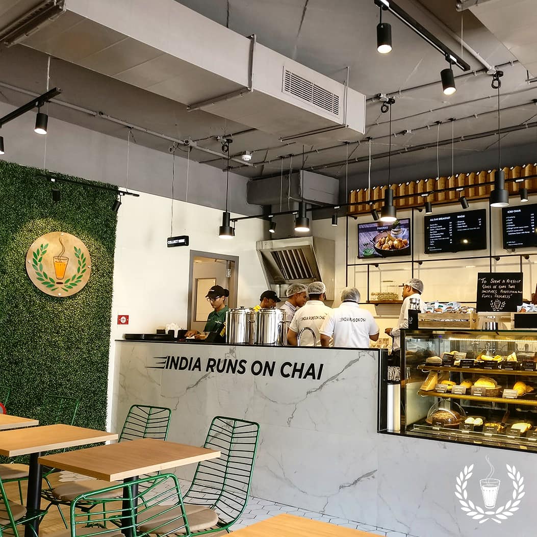 Chai_Point's tweet photo. This #store of ours is located in an urban micro-market and has proximity to key employment hubs such as DLF Cyber City and Sohna Road.
#guess the location of the store and tag your #hangout buddies!
#guessthestore #Gurgaon #Gurugram #TuesdayMotivation #TuesdayTrivia #chai https://t.co/qrM6kQYKUT