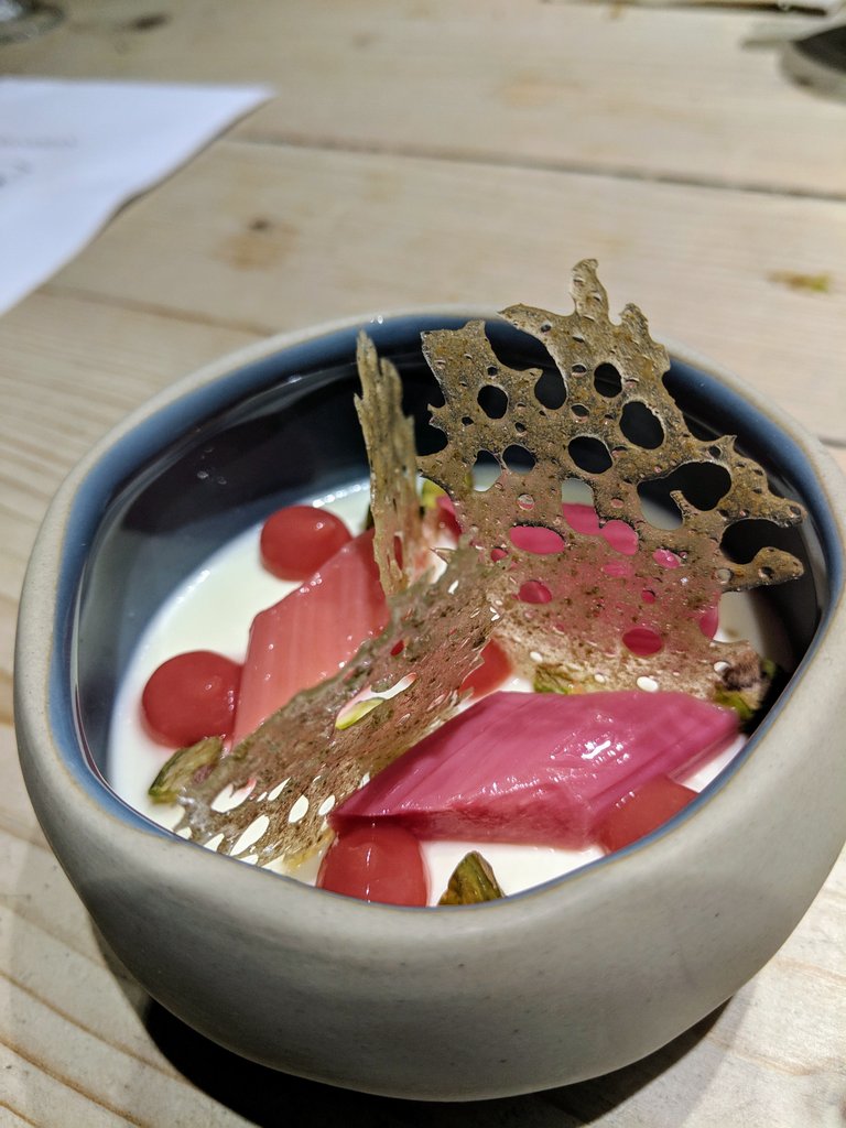 Bay leaf panna cotta with poached Yorkshire rhubarb, pistachios and fennel seed caramel <a href="/ChefAshSaman/">Ash Saman</a>.