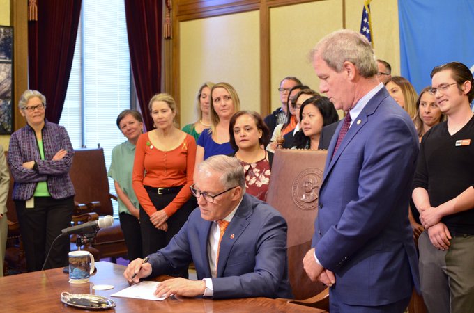 Signing bills that improve gun safety in Washington state.