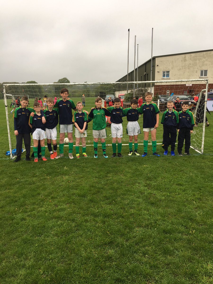 MaighdineMuire's tweet photo. We’re singing in the rain! 🎶 Ballyduff NS South Leinster Champions!!Can’t wait for the trip to Navan on 16th May!So proud of our amazing boys again! Unbelievable heart &amp; represented the school with such respect for the jersey 💚💛@MaighdineMuire @FAIWexfordDO @CloneeLGFC #SPAR5s https://t.co/JUd77TYQuw