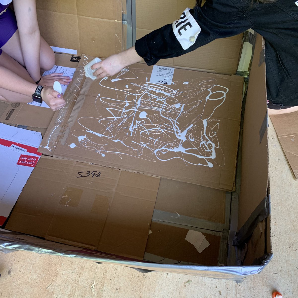 Goodson's tweet photo. Check out these cardboard boats students at Cramerton Middle School are making for the Cramer Mt. cardboard boat race. We’ve been talking engineering and buoyancy. #makers #gcsk12 #STEAM https://t.co/JDllnrE1sp