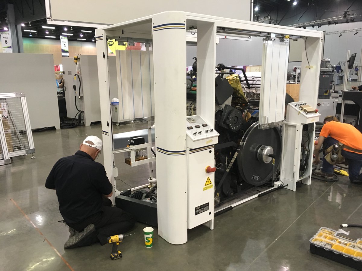 KlugeSolutions's tweet photo. Product Design and Technical Support Manager, KC Chapin, setting up our ApexFoil™ Automatic Platen Press in the #TechShop at #OdysseyExpo. First day of the expo is tomorrow! #Booth214 https://t.co/ee1oqVSlAE