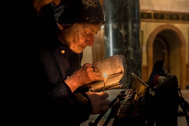 tombourdon's tweet photo. A woman reads a passage from an old book by candlelight during holy week in Georgia.

#Easter #orthodox #christian #photooftheday #travelgram #instatravel #wanderlust #photography #instagood #traveling #trip #beautiful #adventure #explore #vacation #happ… https://t.co/hom1JUzBhl https://t.co/kWjvumhk48