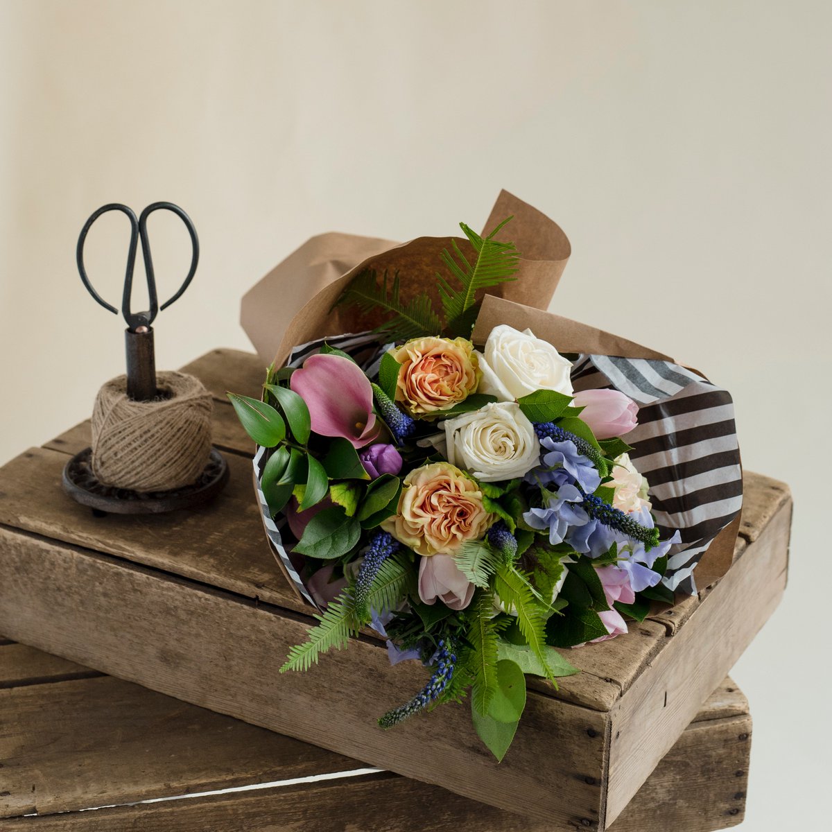 What about a wrap for Mother's Day. Spring blooms in colors of your choice (simply add your preference in the notes section of your order). We'll deliver a wrap starting at $65. (Excludes delivery fee.) Shop now at jmorrisflowers.com/spring-collect….
