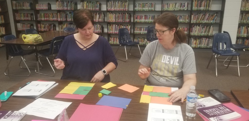 tdhowse_math's tweet photo. Gurdon elementary and middle school teachers reasoning with fractions using fraction kits and models. #DNAMath #MSMT35 #MSMT68 @SolutionTree @Gurdon https://t.co/5cIlJP4I7Z