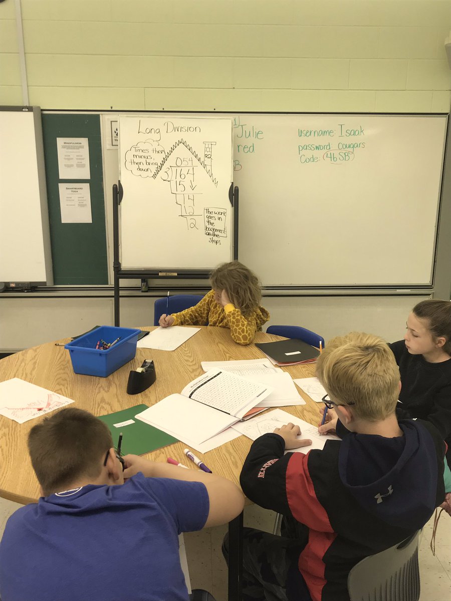 JennaKulyk's tweet photo. Grade 4s @MilestoneCougs using a visual of a house to help them understand long division. They loved it! #learningisfun https://t.co/zx7yoO8uNU