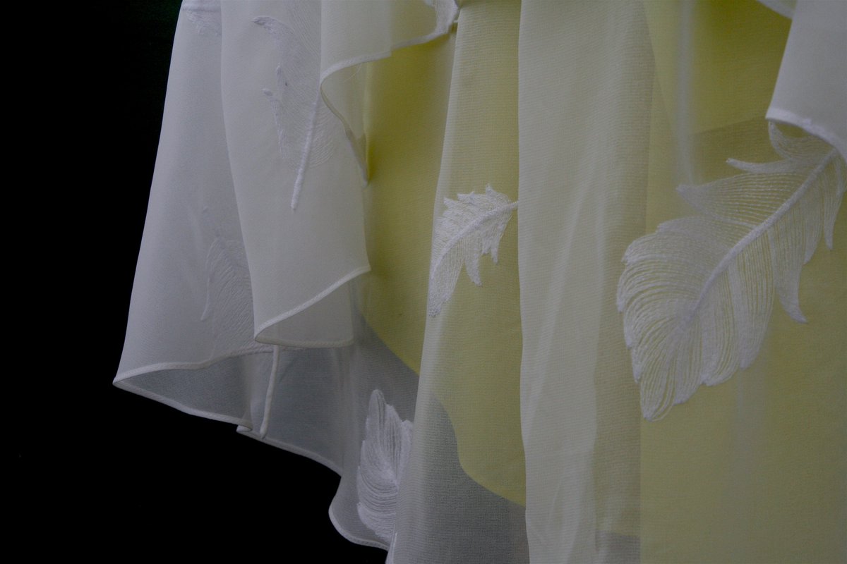 Finely embroidered, the feather detail creates a gentle silhouette against this season’s playful palette. #DB2019