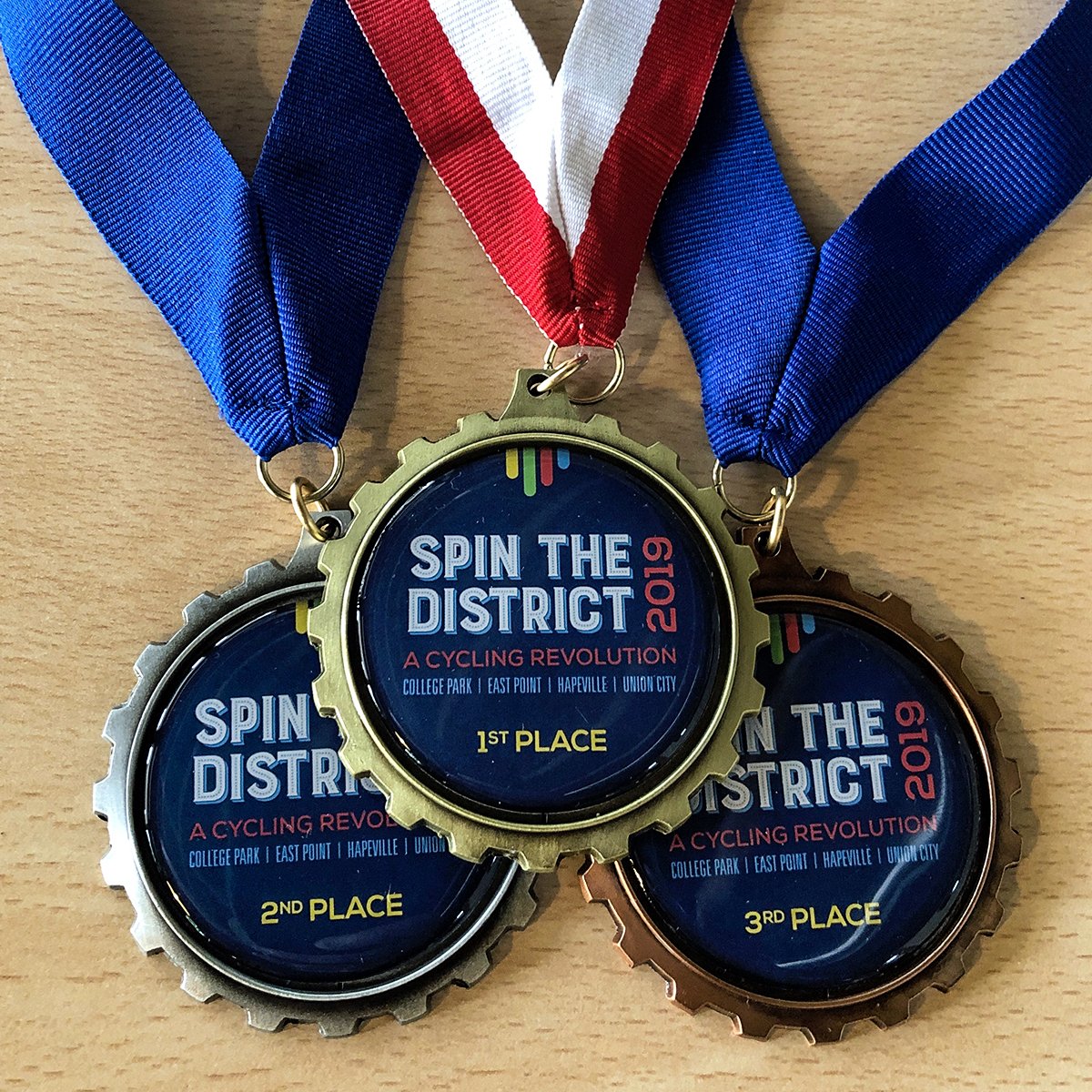Will you be victorious? These sweet medals + $22,000 (total weekend payout) is on the line. Sign up TODAY! Pre-registration ends May 2nd. 🚲🤑💥

Register ▶️ spinthedistrict.com