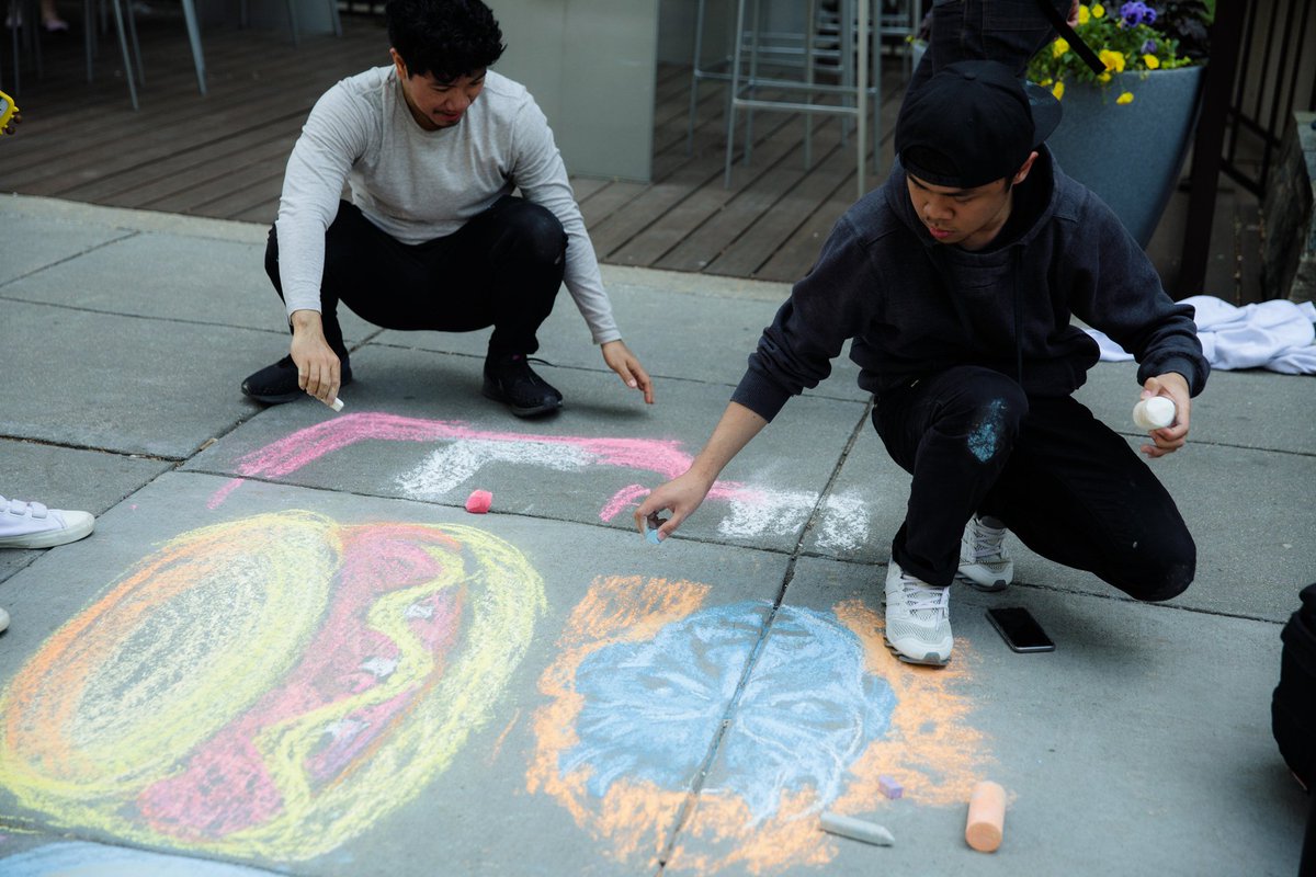 student drawing the game of thrones night king in chalk