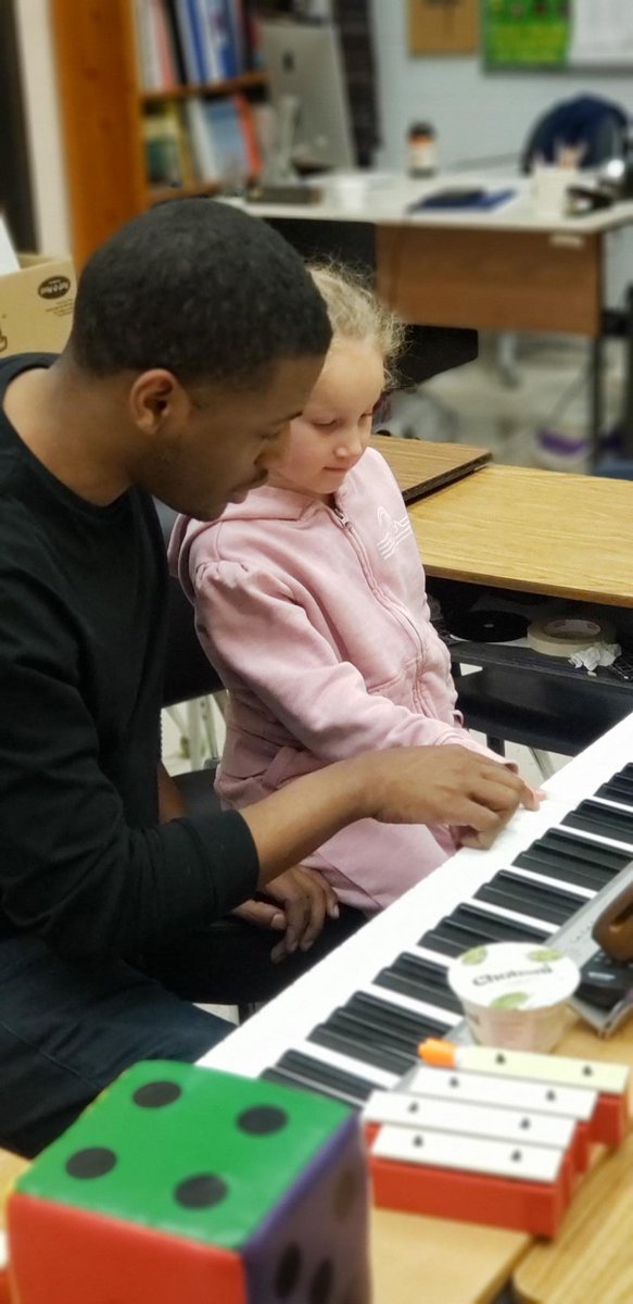 PESAfterSchool's tweet photo. Mr. Bratcher teaching piano lessons in Piano Club. 🎹🎼 #PESRocks #CAREafterschoolacademy 💙💛 @PocomokeElem @FBWilliams_ https://t.co/Lag2YEcsYm