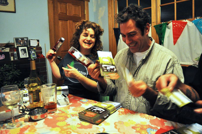 supportland's tweet image. Does anyone remember when we used to hand wrap every Supportland card? 

Here’s a pic from one of our 2010 wine-drunk wrapping parties with the best volunteers in the biz 😊