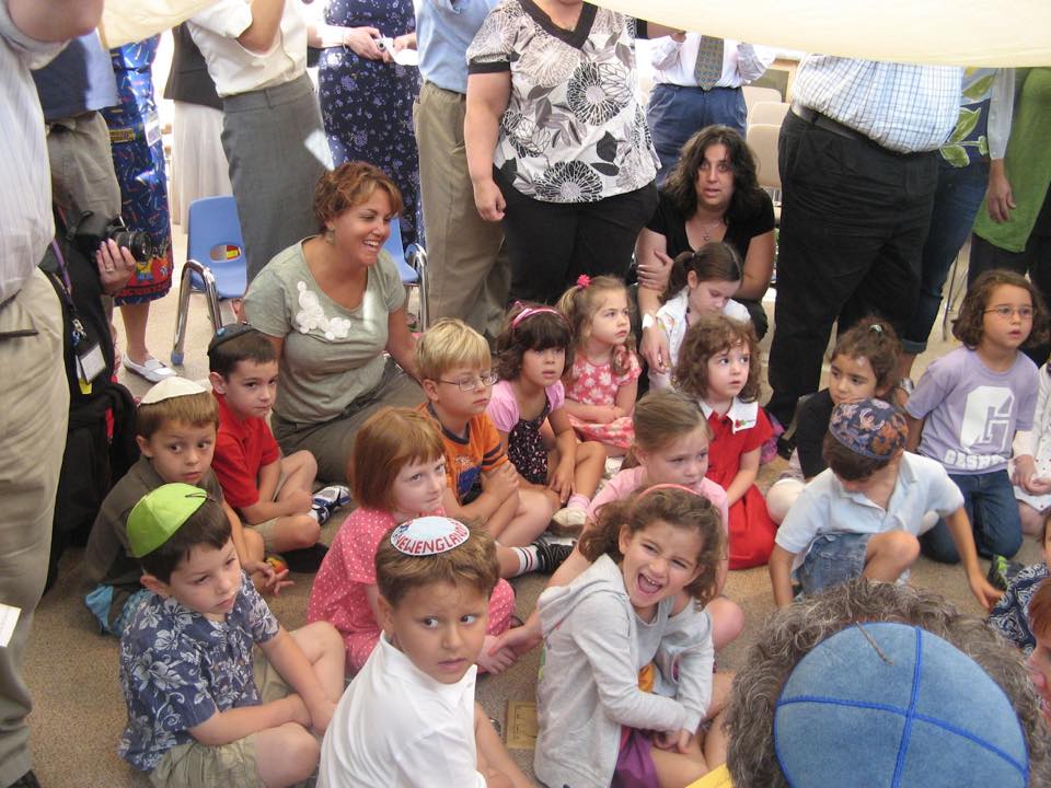 gesherjds's tweet image. Dear 8th graders,

On your first day of kindergarten, we said the Shehecheyanu blessing with you as 5 and 6 year olds gathered together underneath a Tallis.

Today we said it again, this time at the airport as we sent you off on your two week journey throughout Israel.