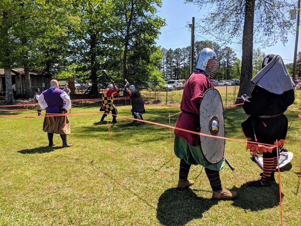 Just a quick picture of a Dane #axe verses Mac Bible #Chooper polearm fight at the @SouthamptonRen and now I need a tunic repaired! Fun fight! #larp #MySCA #armor #knight #dagohir #gameofthrones #hmfws #swords #fullcontact