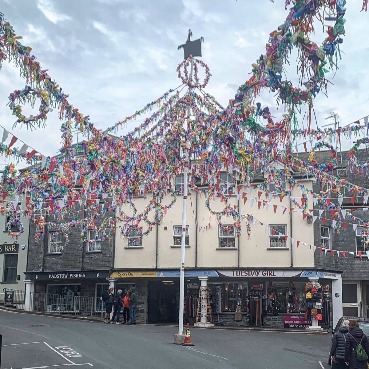 Early morning Padstow, May Day waiting for the festivities to begin “11 am the eagerly awaited hour and the OLD OSS clan wend their way through streets decorated with flags, flowers and greenery”