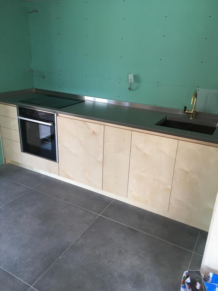 mpmengineering's tweet image. A sharks nose #stainlesssteel #worktop fitted in #Gloucestershire this week with a #welded lined #sink cut out and integrated rear and side upstands looking great against these #ply #doors just the #tiling to go! #uk #stainlesssteelworktops #kitchen #design #kitchendesign