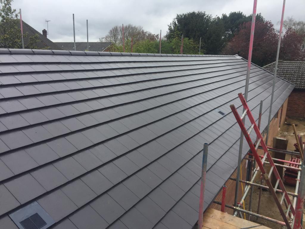 KeystoneRFL's tweet photo. Roofing works complete at Abbey Walk for @Bugler_Devs installing @MarleyLtd Modern roof tiles #workscomplete #roofing #pitchedroofing https://t.co/y7jx7PEGrb