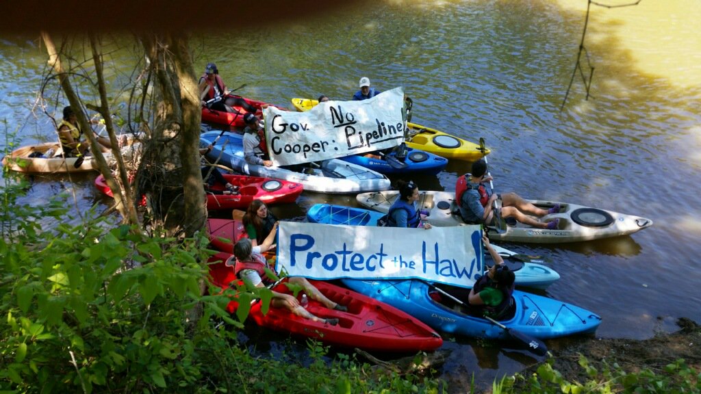 HansleyCaroline's tweet photo. Thank you @HawRiver for a successful campaign launch to stop the proposed #MVPipeline. We had a couple dozen paddlers participate and say #NoMVP! #ProtectTheHaw https://t.co/6pyYzVhUoy https://t.co/rJCpjEQR1G