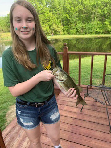 FishingBoston's tweet photo. Maggie bringing in a bass yesterday #bassmaster #bostonrocks https://t.co/HvdvZUQjkA