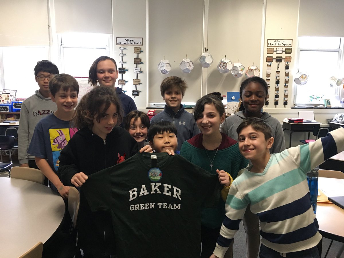 Happy Walk, Bike, Roll, or Bus to School Day! The Green Team was out this morning stamping the hands of kids who came to school car-free. The bike rack was overflowing!