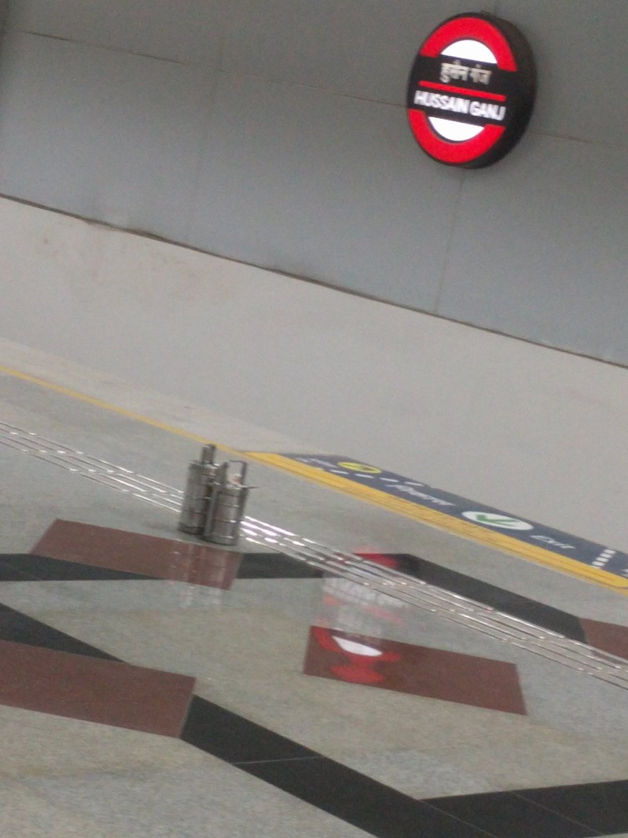 divirvij's tweet photo. Suspicious Tiffins at Husainganj Metro Station. Security staff clueless. On more coaxing found out to be of PAC staff left by their delivery guy. Lucknow Metro should take a look into it and no unattended articles be left around by security or metro officials #lmrc #lucknowmetro https://t.co/AtrFbUjIjA