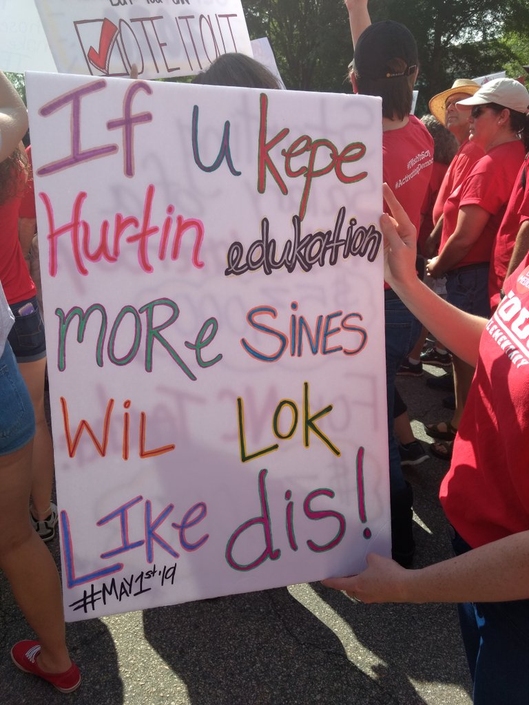 Sarah_Willets's tweet photo. As a writer this may be my fave #RedforEd sign so far. It's by Kaycy Joyce, a fifth grade teacher from Guilford (who I couldn't get in the pic BC it's so packed on South Street. https://t.co/NQizyBdzFq