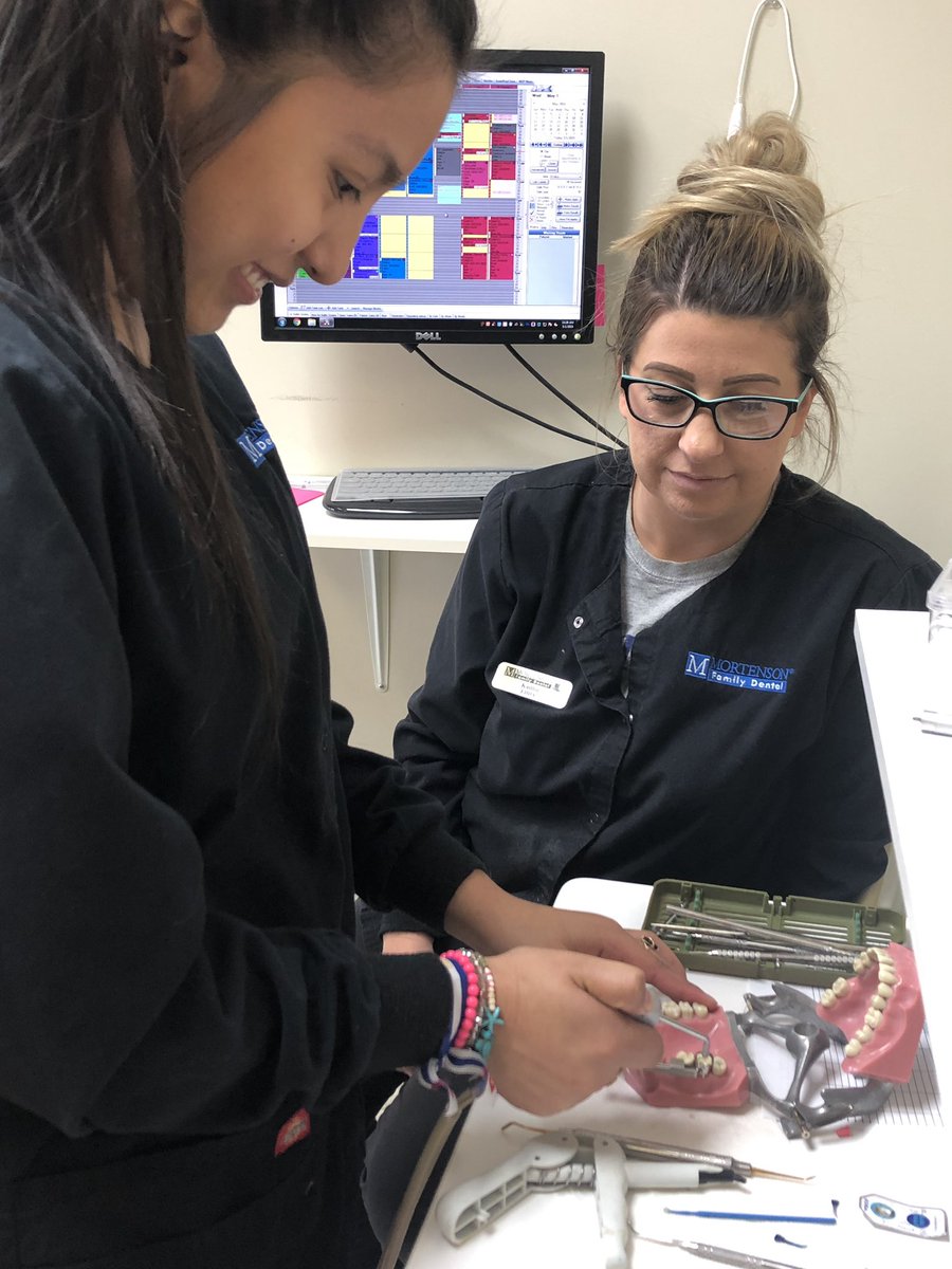 shelbycountysch's tweet photo. Aura Noriega works with Kaitlin at Mortenson West to learn important competencies for a dental assistant. Aura is a student of the dentistry program at the Shelby County Area Technology Center. For more information about enrollment in the program contact @ShelbyCoATC https://t.co/1pc3iVEaQl