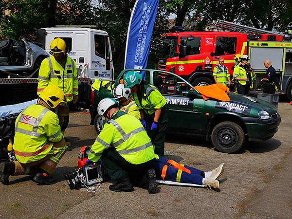 NorfolkPCC's tweet photo. "Today I was the passenger. It was overwhelming... it could be me, it could actually happen." Some excellent young driver volunteers from @kesacademy took part in today's 50th #Impact #roadsafety event with @Norfolkfire @EastEnglandAmb @NorfolkPolice.  https://t.co/bepMkgG58S https://t.co/Pgvkm2K2c3