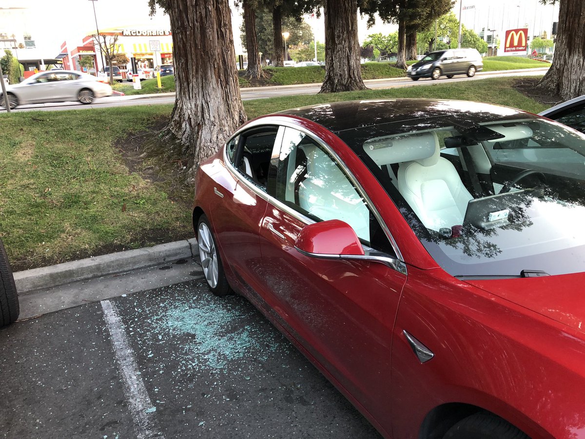 vsebastian's tweet photo. My rental #Tesla Model3 got broken into during our trip. So sad. 2 bags stolen from the trunk accessed from the rear passenger seat. Looks like same MO via the glass like other breakins. Sadly forgot to turn on sentry mode. Looks like thieves are targeting @Tesla @elonmusk https://t.co/fhDAYKIQTA