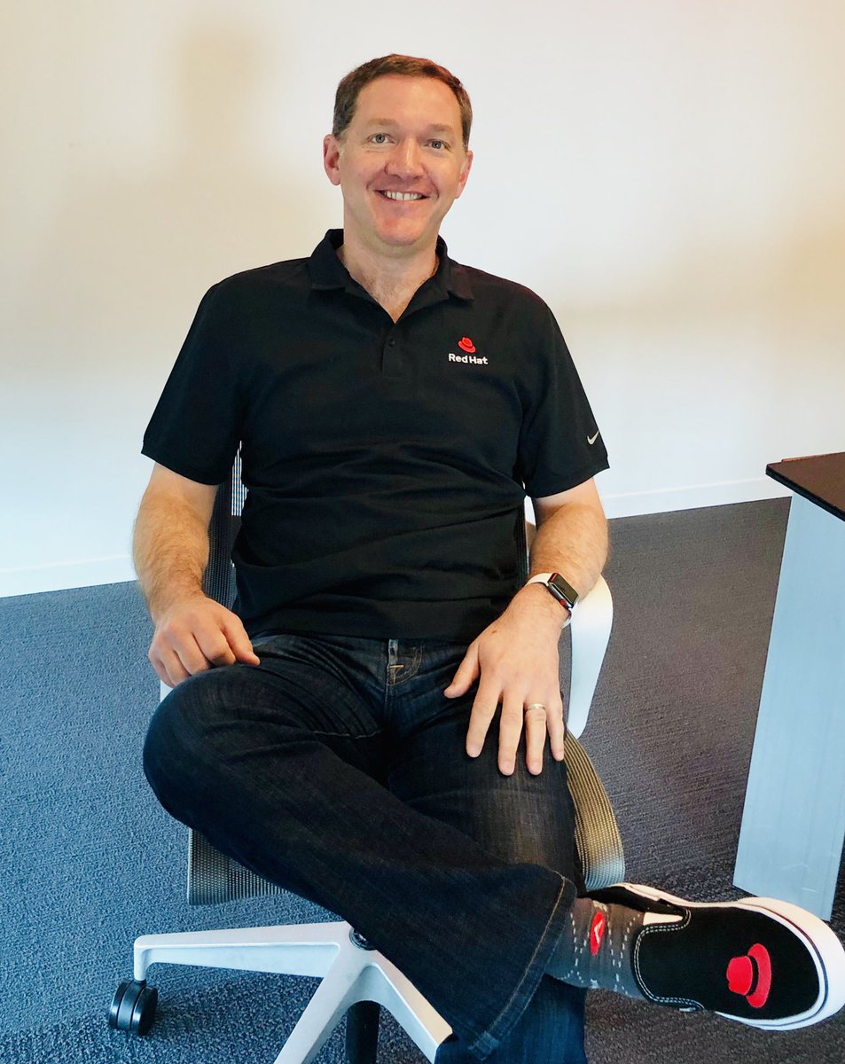 JWhitehurst's tweet image. I’ll see your socks and raise you a shirt and shoes :-) Thanks for the new kicks (and logo!) Tim and team, just in time for #RHSummit #OpenBrandProject