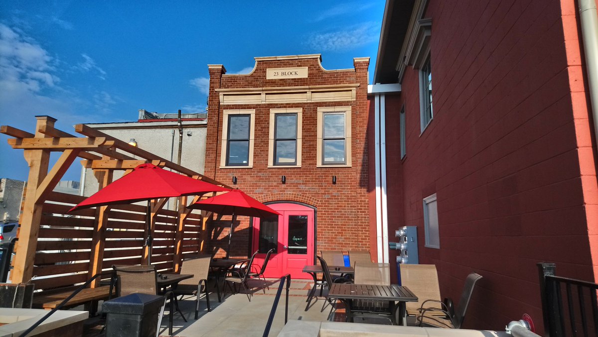 Before and After photographs of the alley side of 23 Block Avenue in Downtown Fayetteville. Previous home J R's Lightbulb Club, now Pinpoint Pinball Bar with Lola's boutique on the upper floor.