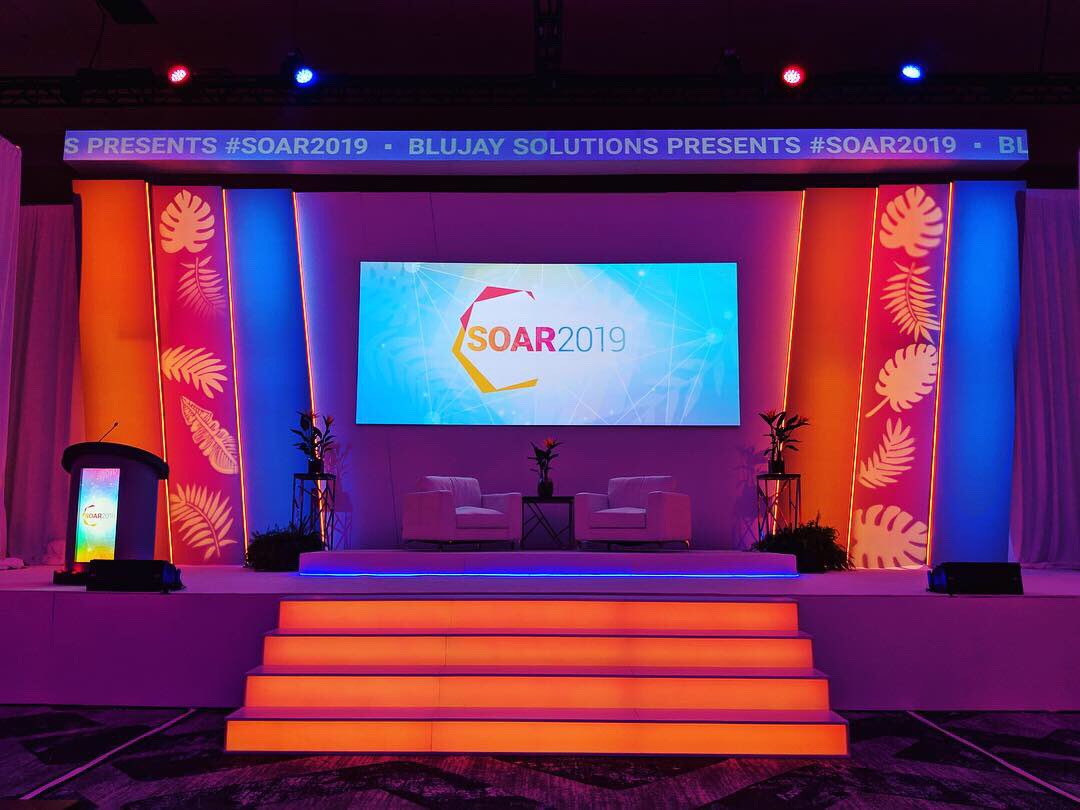 thinkcybis's tweet image. This is the stuff we live for—Team Cybis was fortunate enough to produce the General Sessions for BluJay Solutions’ SOAR 2019 Customer Conference and built an entire custom set for the event! @BluJaySolutions #BluJaySolutions #SOAR2019 #stage #events #audiovisual