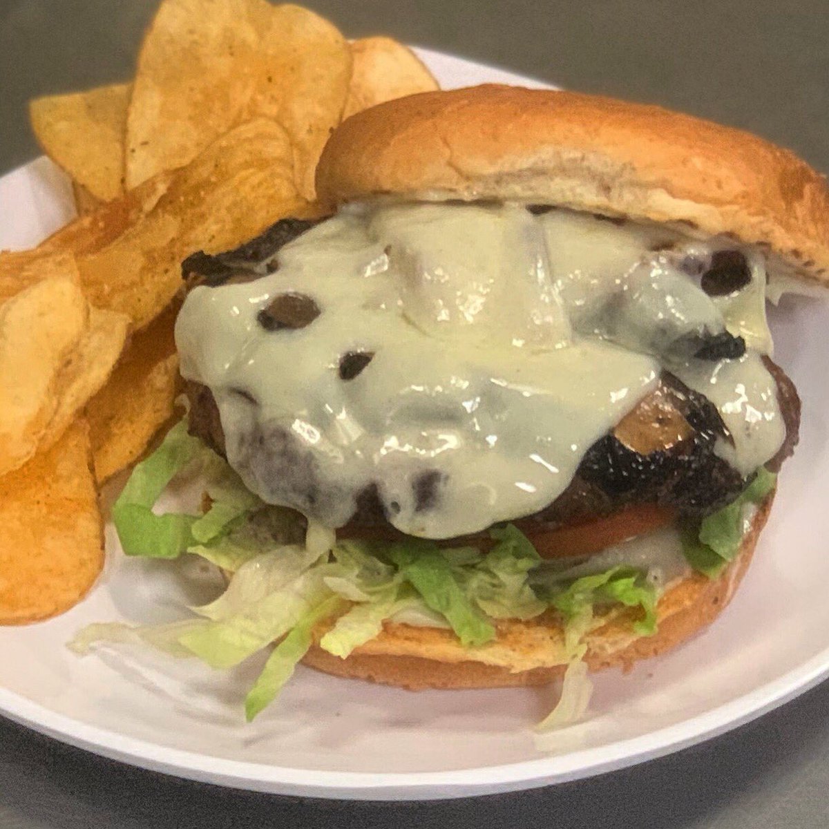 RevsBarAndGrill's tweet photo. “The Mushroom Kingdom” - local beef burger, grilled portobello, bacon, swiss cheese, lettuce, tomato, mayo. Available today only! https://t.co/y2UJkLI3Bx
