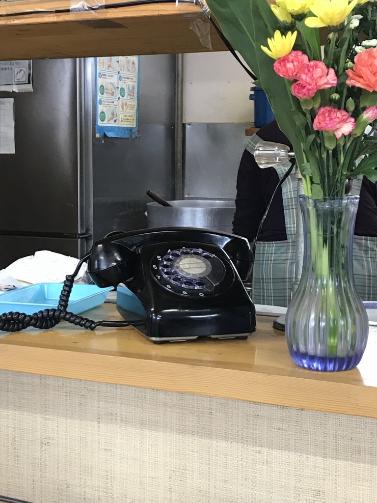 MorningSardine's tweet photo. This fossil was being used as the ramen restaurant’s main phone line. It rang a few times as we ate.
#iwate #ruraljapan #howdoyouusethisthing? https://t.co/SzFjRzTzPc