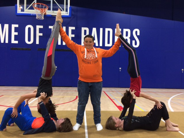 Check out some of the partner poses from our Spring ES Gymnastics group!