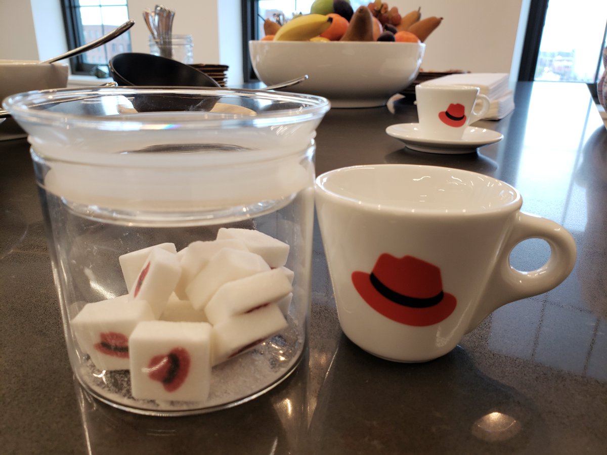 mdharani's tweet image. Attending a briefing at #RedHat Boston office and look what @willnix found.  Brand new logo espresso cups and sugar cubes. #OpenBrandProject