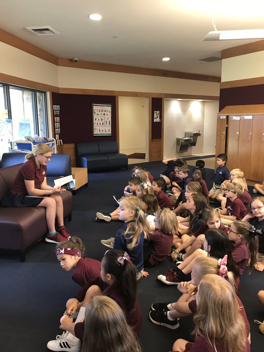 A WA student is sharing her personal project with grade two students! She is a writer, recording the history of our school! #WAexcels